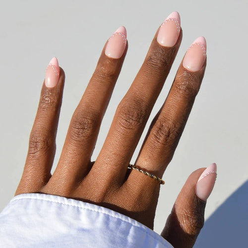 Pink Me Up milky cloud dancer press-on nails - almond shape, front view