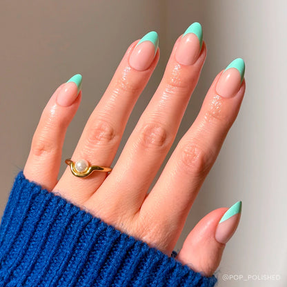 Pistachio Crème french tip press-on nails - almond shape, front view