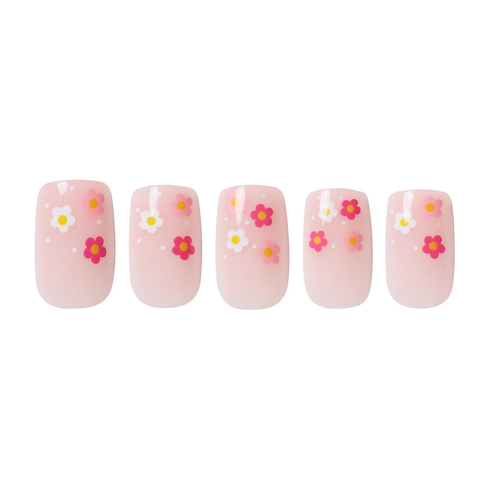 Pretty Bloom press-on nails close-up texture detail - french tip finish, US shipping