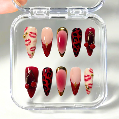 Red Kiss press-on nails on hand - lifestyle photo, berry finish