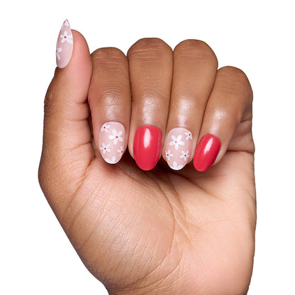 Red Blossom press-on nails on hand - lifestyle photo, floral finish