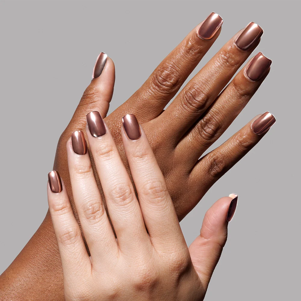 Rose Gold press-on nails on hand - lifestyle photo, pearl-shift finish