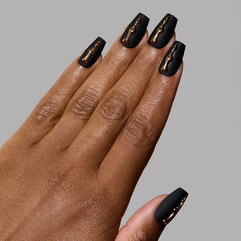 Rosy Remains press-on nails on hand - lifestyle photo, 3d sculptural finish