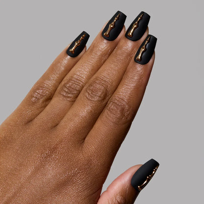 Rosy Remains press-on nails on hand - lifestyle photo, 3d sculptural finish