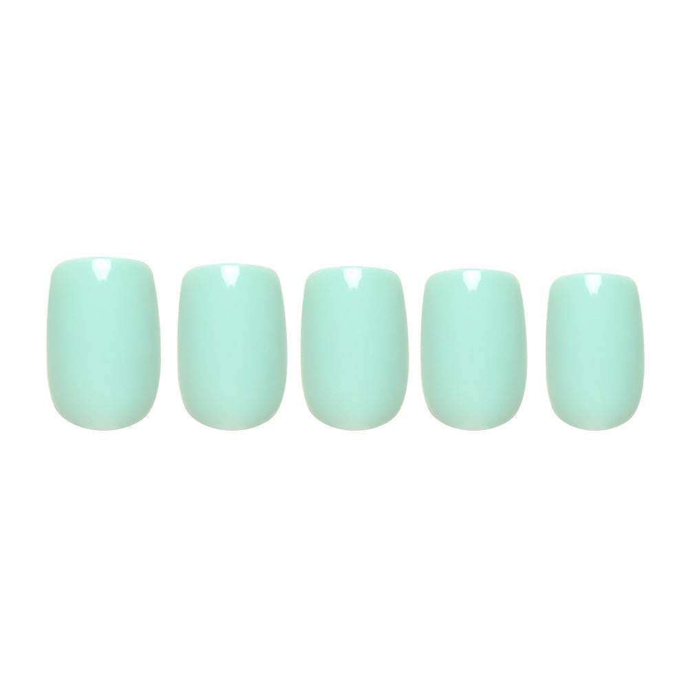 Soft Teal press-on nails on hand - lifestyle photo, soft neutral finish