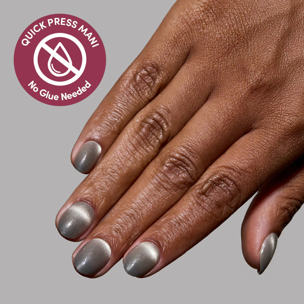 Sparkly Moss press-on nails on hand - lifestyle photo, cat-eye velvet finish