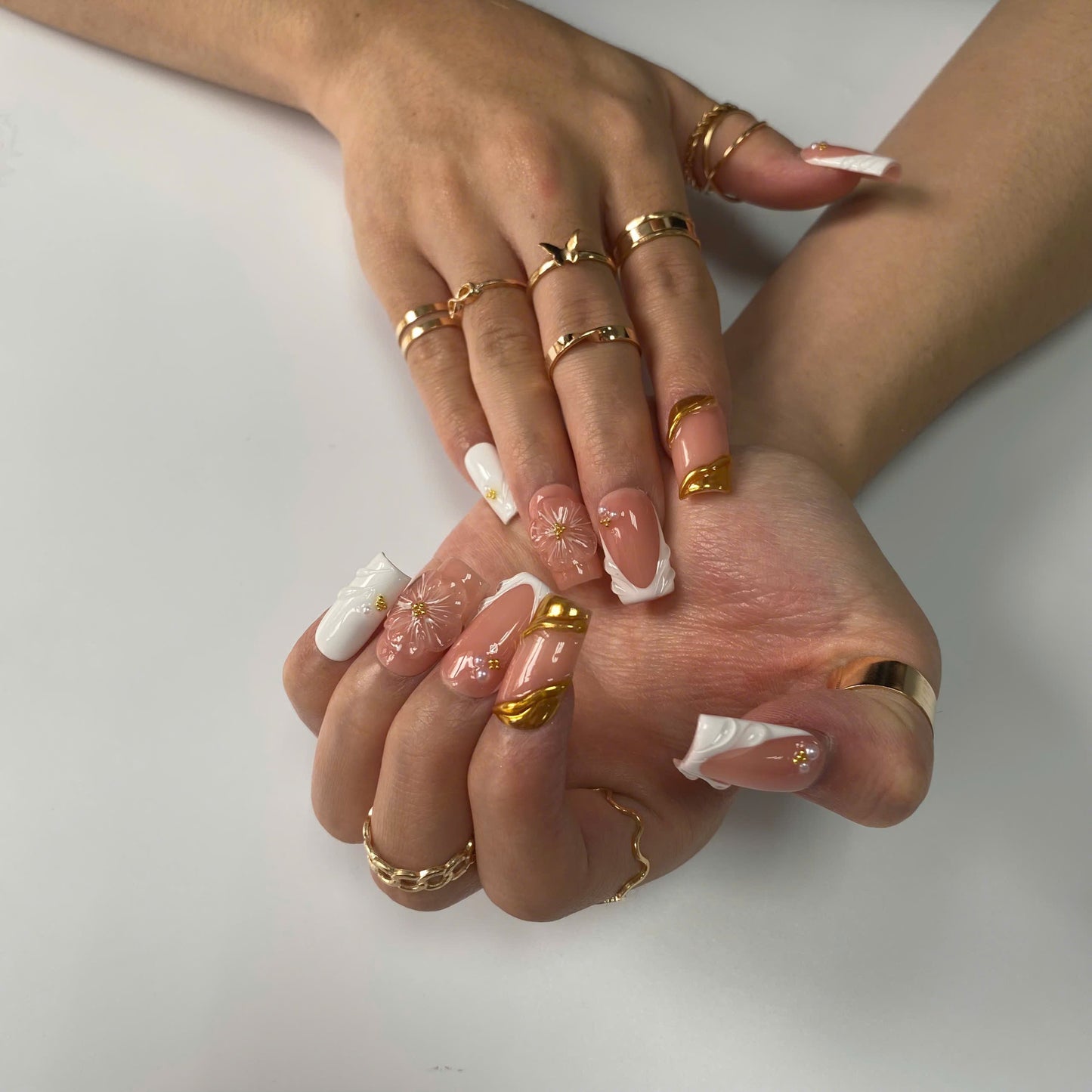 Ivory Grace press-on nails on hand - lifestyle photo, milky cloud dancer finish