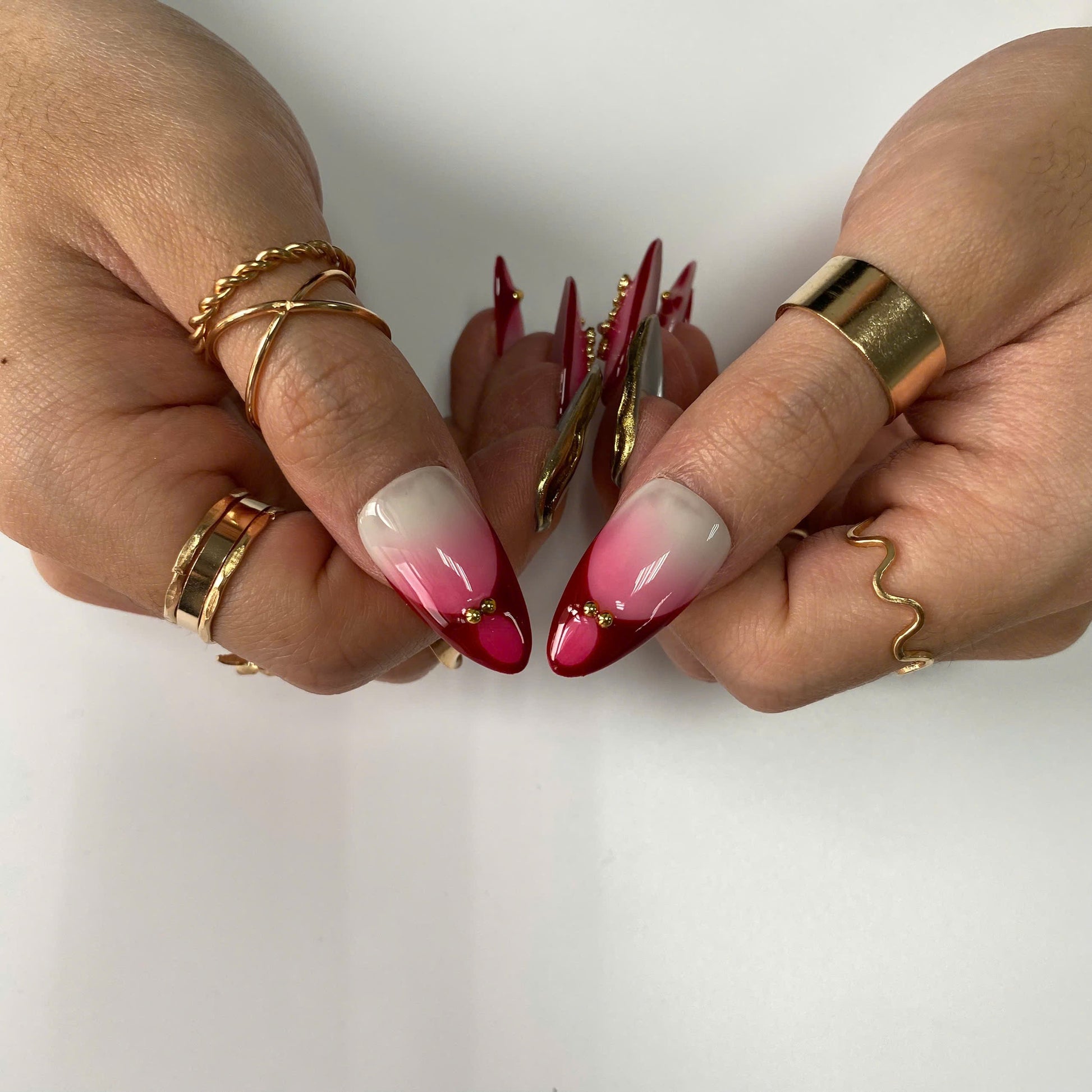 Crimson Reverence press-on nails on hand - lifestyle photo, french tip finish