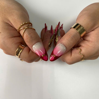 Crimson Reverence press-on nails on hand - lifestyle photo, french tip finish